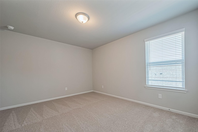 22807 Ephesus Ave, Tomball, TX 77377 - spare room with light carpet and baseboards