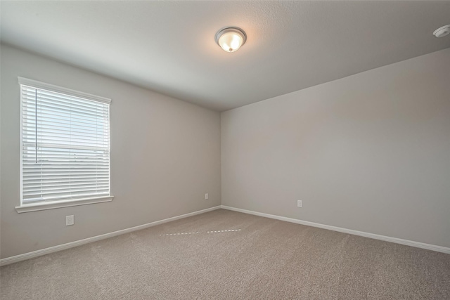 22807 Ephesus Ave, Tomball, TX 77377 - empty room featuring carpet and baseboards