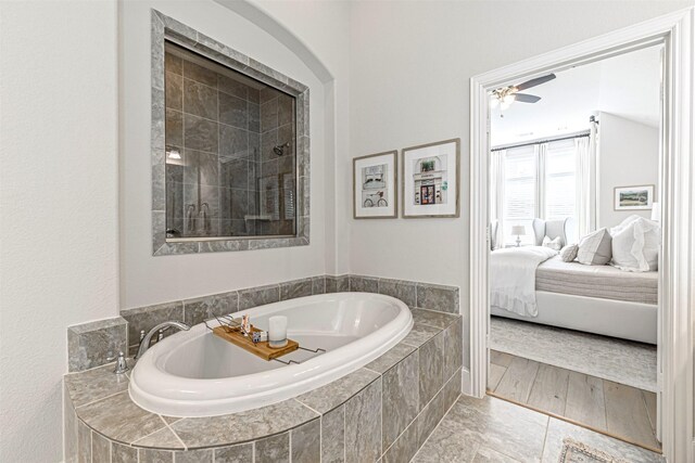 10311 Belvamera Rd, Richmond, TX 77407 - ensuite bathroom with a bath and ceiling fan