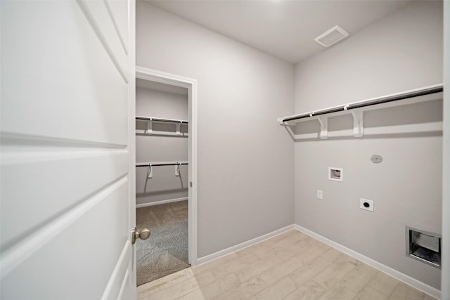 3211 Falling Brook Dr, Baytown, TX 77521 - washroom with electric dryer hookup, hookup for a washing machine, gas dryer hookup, and baseboards