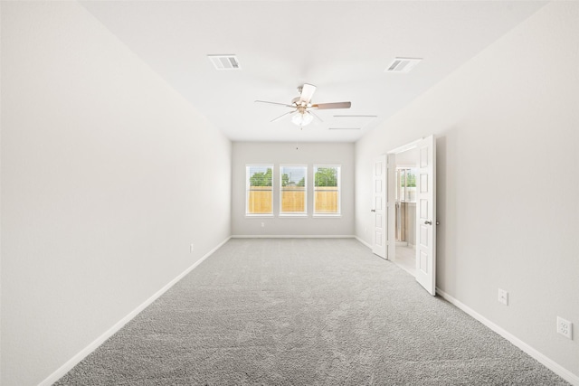 3211 Falling Brook Dr, Baytown, TX 77521 - carpeted spare room with ceiling fan and baseboards