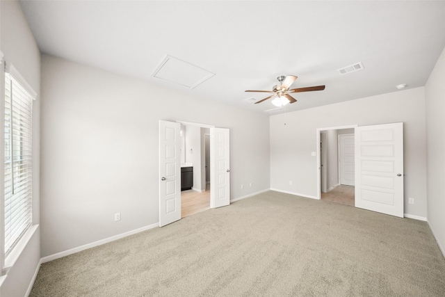 3211 Falling Brook Dr, Baytown, TX 77521 - unfurnished bedroom featuring carpet floors, baseboards, connected bathroom, and a ceiling fan