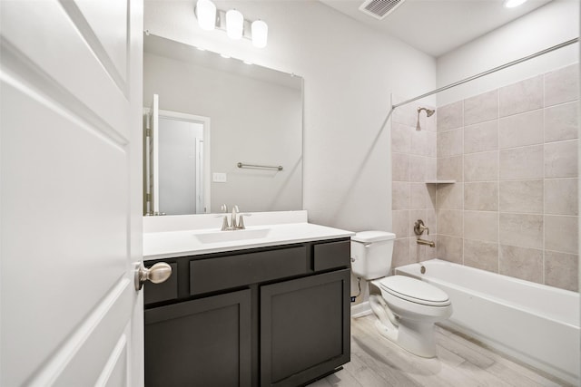 3211 Falling Brook Dr, Baytown, TX 77521 - full bathroom featuring toilet, vanity, and tub / shower combination