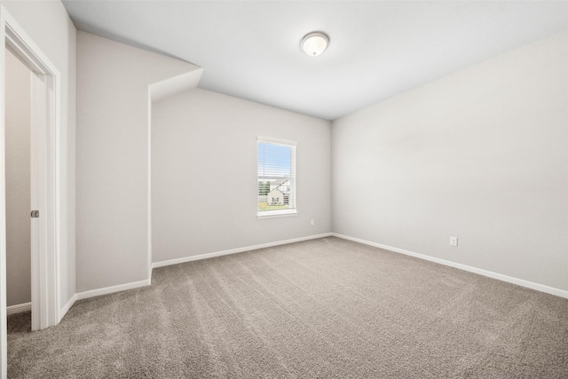 3211 Falling Brook Dr, Baytown, TX 77521 - unfurnished bedroom with carpet flooring and baseboards