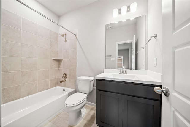 3211 Falling Brook Dr, Baytown, TX 77521 - bathroom with toilet, vanity, shower / washtub combination, and baseboards