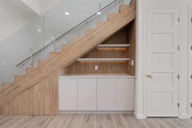 5606 Circe Cir Unit A, South Padre Island, TX 78597 - stairway with wood finished floors