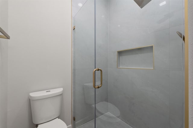 5606 Circe Cir Unit A, South Padre Island, TX 78597 - full bathroom featuring toilet and a stall shower