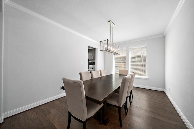 2334 Calm Channel Ct, Missouri City, TX 77459 - dining room with ornamental molding, dark wood-style floors, baseboards, and a chandelier