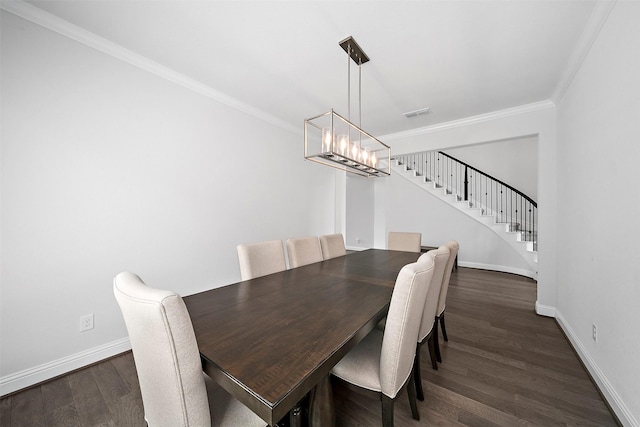 2334 Calm Channel Ct, Missouri City, TX 77459 - dining area featuring baseboards, stairway, crown molding, a chandelier, and dark wood-type flooring