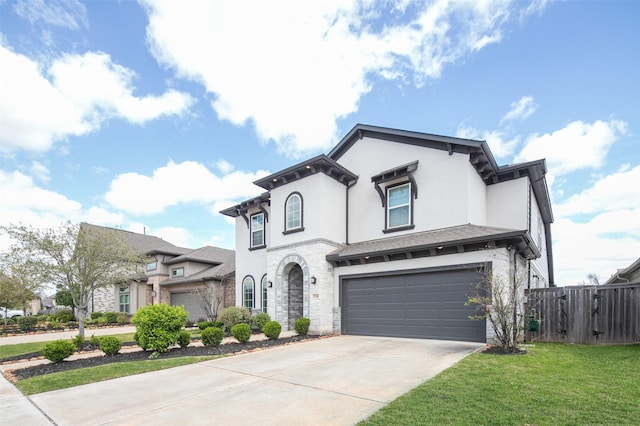 2334 Calm Channel Ct, Missouri City, TX 77459 - view of front facade with a garage, driveway, stucco siding, and stone siding