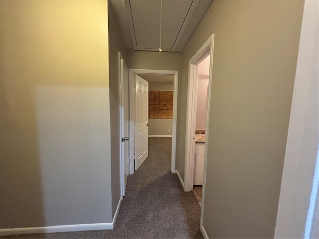 1102 Laurentide St, Houston, TX 77029 - corridor featuring attic access, baseboards, and carpet floors