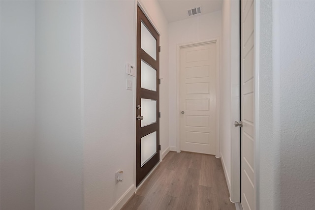 8933 Grovner Pl, Houston, TX 77055 - hallway with wood finished floors and baseboards