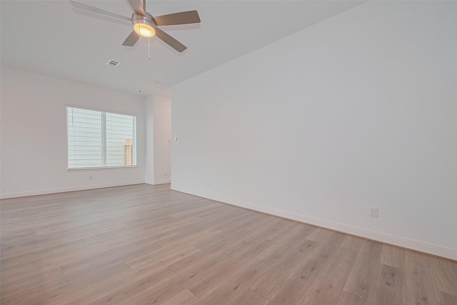 8933 Grovner Pl, Houston, TX 77055 - unfurnished room with light wood-type flooring, baseboards, and ceiling fan