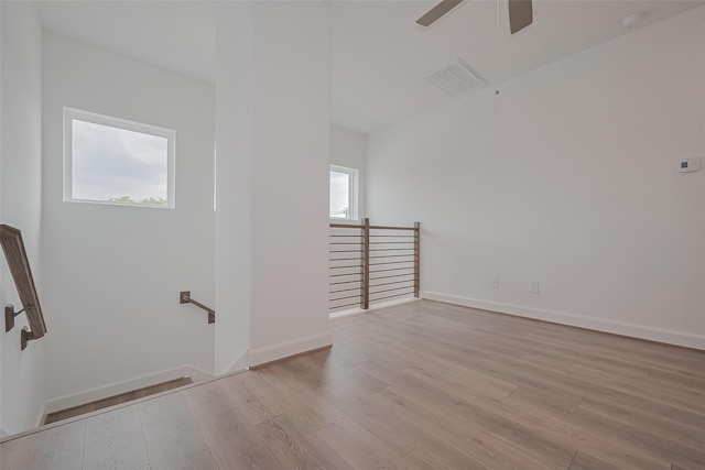 8933 Grovner Pl, Houston, TX 77055 - spare room with plenty of natural light, wood finished floors, ceiling fan, and baseboards