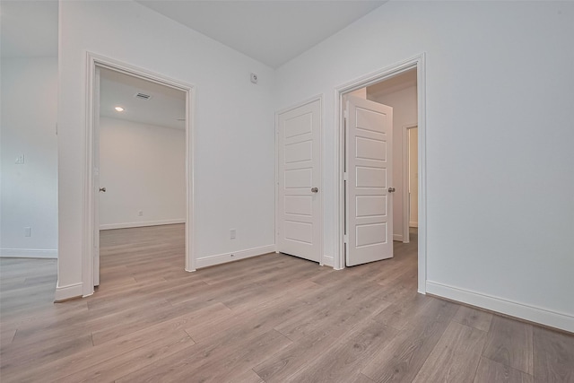 8933 Grovner Pl, Houston, TX 77055 - empty room with light wood-type flooring and baseboards