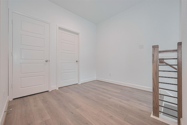 8933 Grovner Pl, Houston, TX 77055 - spare room featuring light wood finished floors and baseboards
