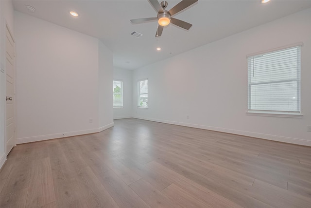 8933 Grovner Pl, Houston, TX 77055 - spare room with light wood-style flooring, ceiling fan, baseboards, recessed lighting, and a smoke detector