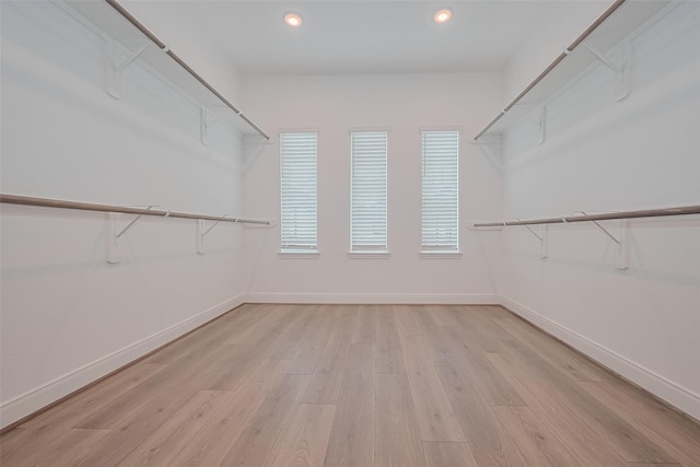 8933 Grovner Pl, Houston, TX 77055 - spacious closet featuring light wood finished floors