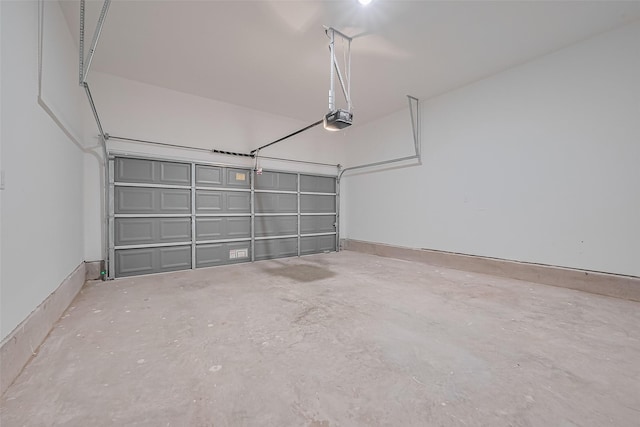 8933 Grovner Pl, Houston, TX 77055 - garage featuring a garage door opener