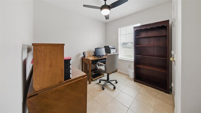 906 Juniper Ct, Tomball, TX 77375 - home office with a ceiling fan, baseboards, and light tile patterned floors