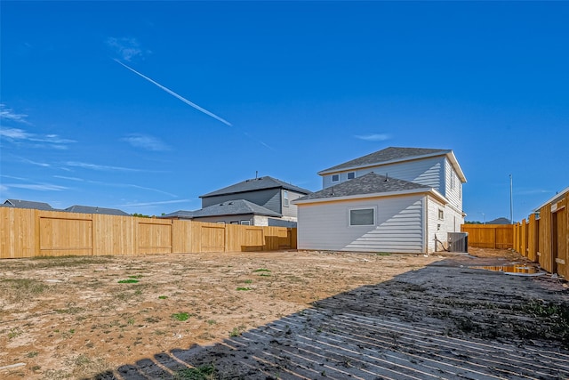 10155 Red Snapper Rd, Magnolia, TX 77354 - fenced backyard featuring central AC unit