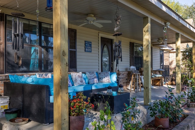 90 Fishermans Bend Dr, Point Blank, TX 77364 - porch with a ceiling fan and an outdoor hangout area