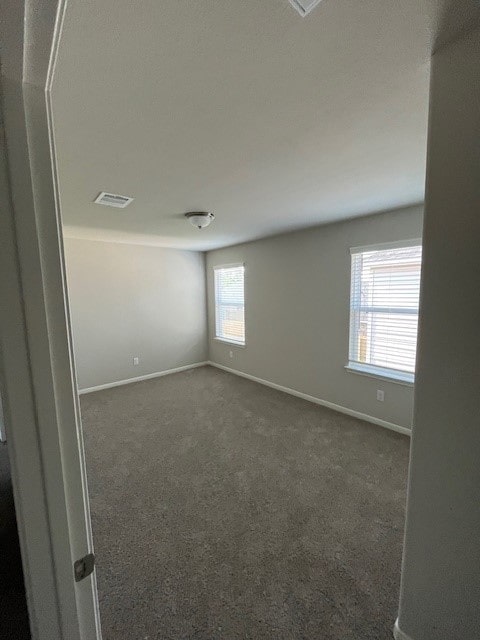 27290 Axis Deer Trl, Magnolia, TX 77354 - unfurnished room featuring dark carpet and baseboards