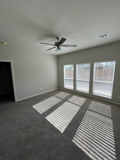 27290 Axis Deer Trl, Magnolia, TX 77354 - carpeted empty room featuring a ceiling fan and baseboards