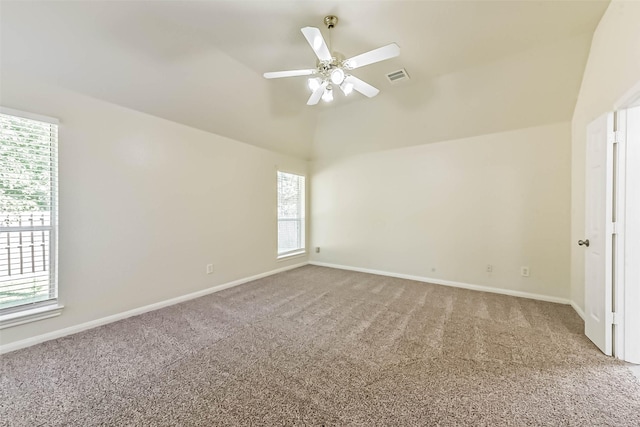 3506 Hickory Hill Ln, Montgomery, TX 77356 - empty room with carpet flooring, lofted ceiling, baseboards, and ceiling fan