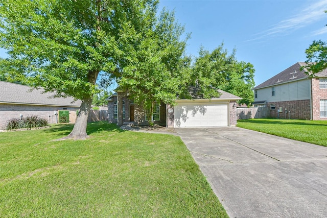 3506 Hickory Hill Ln, Montgomery, TX 77356 - obstructed view of property with concrete driveway, an attached garage, and brick siding