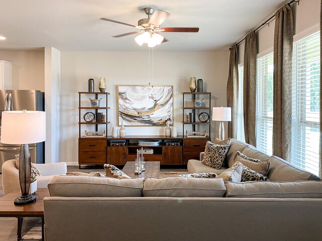 2220 Manila Ln, Texas City, TX 77568 - living area with a ceiling fan and wood finished floors