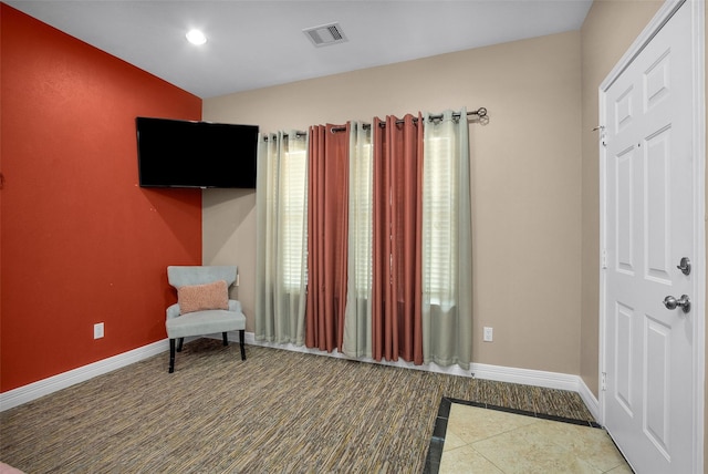 7039 Kingston Cove Ln Unit 309, Willis, TX 77318 - unfurnished room with baseboards, recessed lighting, and inlaid floor details