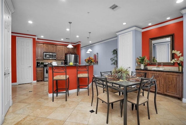 7039 Kingston Cove Ln Unit 309, Willis, TX 77318 - dining area featuring crown molding, recessed lighting, and baseboards