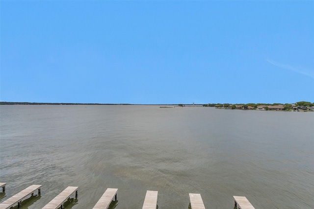 7039 Kingston Cove Ln Unit 309, Willis, TX 77318 - dock area with a water view
