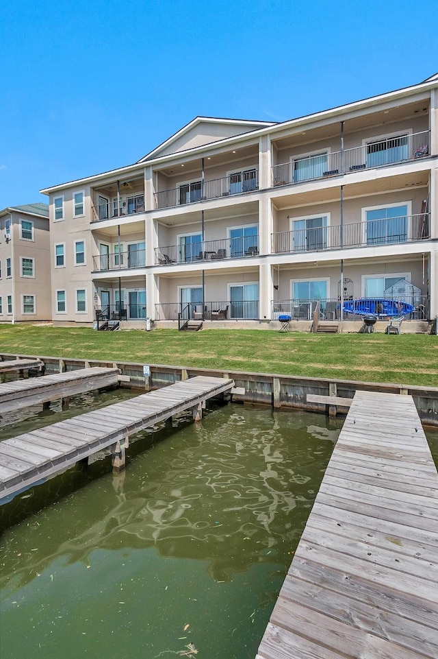 7039 Kingston Cove Ln Unit 309, Willis, TX 77318 - dock area with a water view