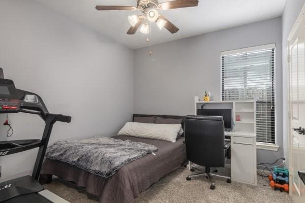 1042 W 23rd St Unit D, Houston, TX 77008 - bedroom with an office area, light carpet, and ceiling fan