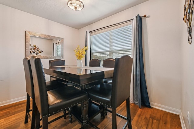 850 Driftwood Ln, La Marque, TX 77568 - dining area featuring baseboards and wood finished floors