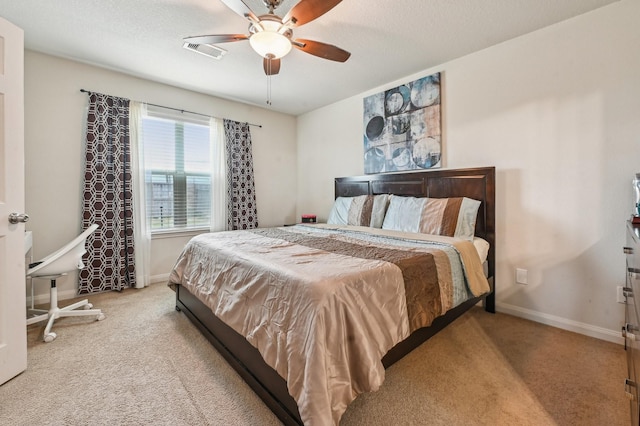 850 Driftwood Ln, La Marque, TX 77568 - carpeted bedroom with baseboards and ceiling fan