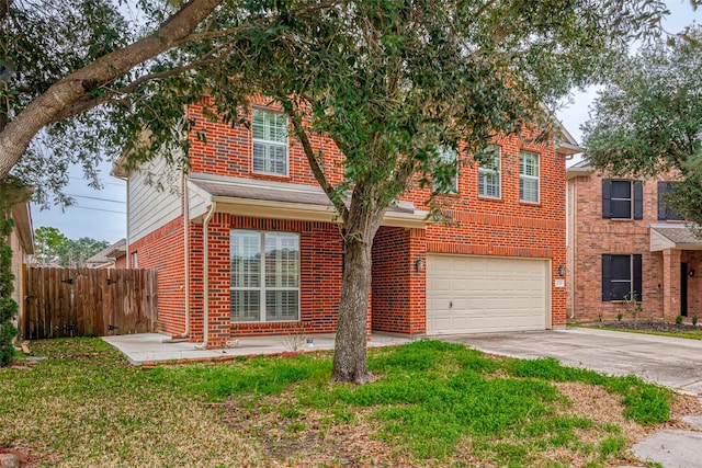 2710 Marigny Dr, Houston, TX 77014 - view of front of house with brick siding, driveway, and an attached garage