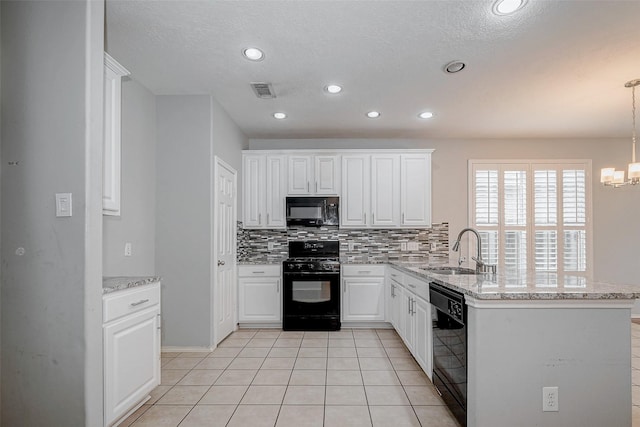 2710 Marigny Dr, Houston, TX 77014 - kitchen featuring black appliances, a sink, a peninsula, decorative backsplash, and white cabinetry