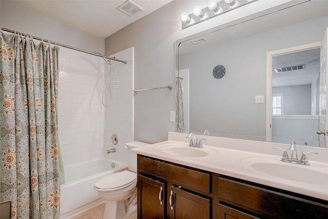 2710 Marigny Dr, Houston, TX 77014 - full bath with double vanity, shower / bath combo, and toilet