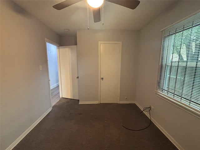 6210 Annunciation St, Houston, TX 77016 - unfurnished bedroom featuring carpet flooring, baseboards, and ceiling fan