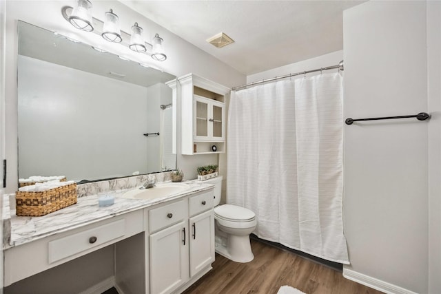 11143 Dawn Harvest Dr, Houston, TX 77064 - bathroom featuring vanity, wood finished floors, and a shower with shower curtain
