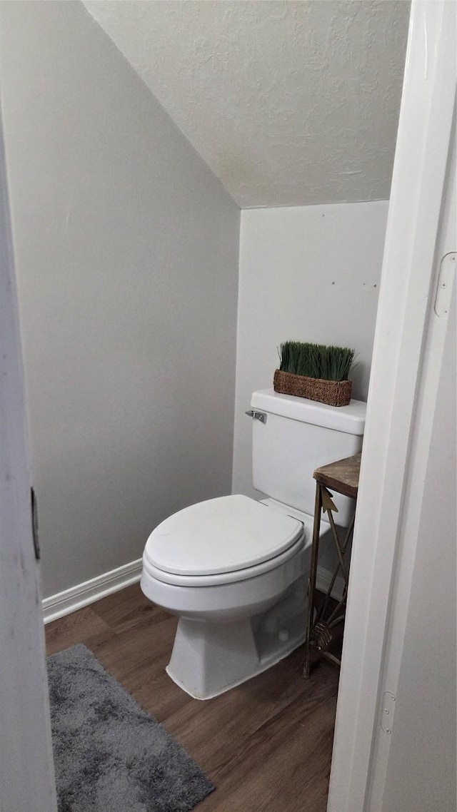 11143 Dawn Harvest Dr, Houston, TX 77064 - bathroom featuring wood finished floors and a textured ceiling