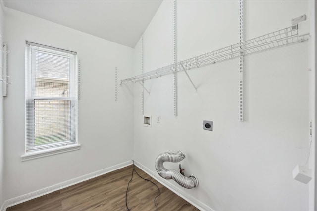 11143 Dawn Harvest Dr, Houston, TX 77064 - laundry room featuring hookup for an electric dryer, hookup for a washing machine, and wood finished floors