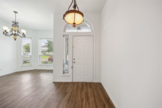 11143 Dawn Harvest Dr, Houston, TX 77064 - foyer with a chandelier and dark wood finished floors