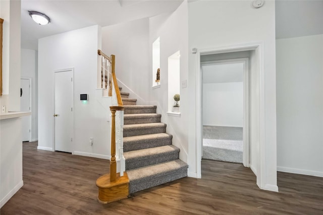 11143 Dawn Harvest Dr, Houston, TX 77064 - staircase with wood finished floors and baseboards