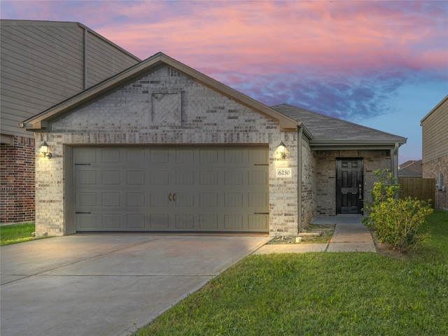 6230 El Cobre Dr, Houston, TX 77048 - view of front of home featuring brick siding, a garage, driveway, and roof with shingles