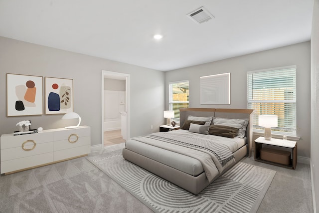 6230 El Cobre Dr, Houston, TX 77048 - bedroom with carpet flooring, baseboards, and connected bathroom