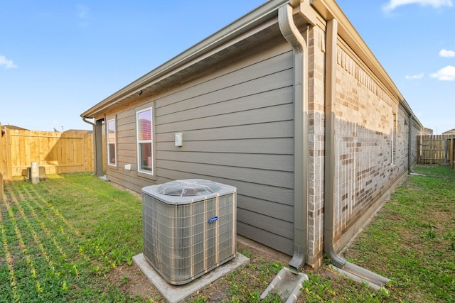 6230 El Cobre Dr, Houston, TX 77048 - view of property exterior with central AC